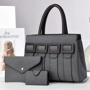 Three-piece vintage grey woven tote bag set with brown leather straps and envelope pouch