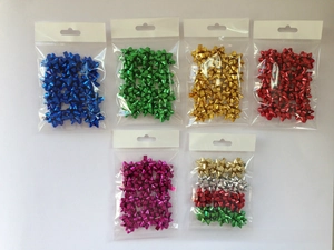 Bulk set of mini metallic star bows in various colors for festive gift wrapping decoration