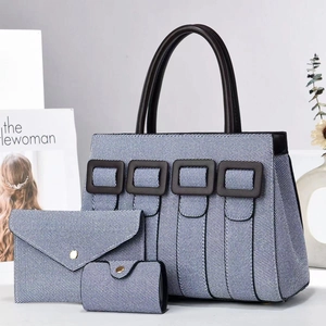 Three-piece set blue textured tote bag with leather straps and envelope clutch