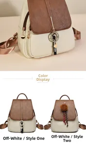 Detail of a beige and brown faux leather backpack with metallic chain and smiley charm