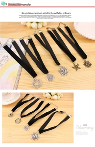 Detailed set of black velvet chokers featuring vintage celestial and starfish pendants