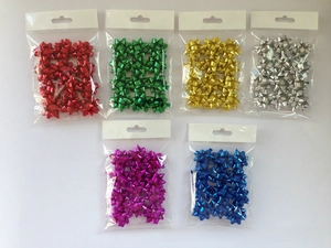 Detailed view of six colorful metallic star bows in hanging retail packaging for gifts