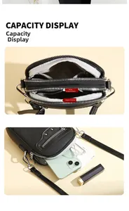 Internal layout of small crossbody bag showing compartments and capacity for phone