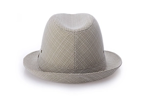 Detail of grey-brown woven fedora hat featuring classic indented crown and metal eyelets