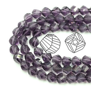 Macro view of purple crystal fish beads with diamond facets and center hole for DIY jewelry