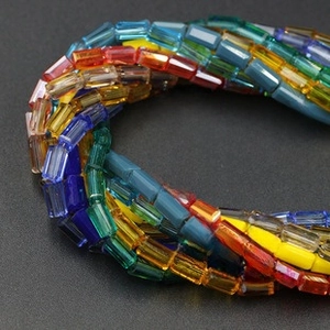 Macro shot of colorful diamond-cut crystal glass beads for DIY jewelry making