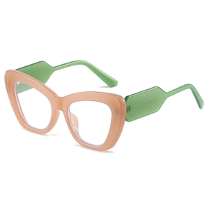 Fashionable cat-eye sunglasses with peach transparent frame and light green temples