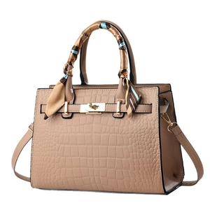 Classic brown crocodile pattern tote bag with gold metal lock and silk scarf handle