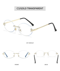 Detail view of gold metal twisted temples and rimless oval lenses on stylish sunglasses