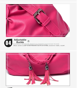 Detail of adjustable metal buckle and woven handle on magenta lychee texture tote bag