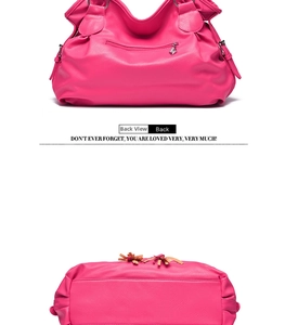 Detailed back and bottom view of rose red pebble grain leather tote bag with silver hardware