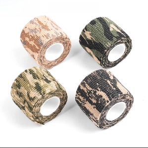 Detailed view of four non-woven camouflage tape rolls for outdoor gear wrapping