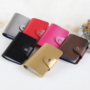 Detail view of colorful PU leather coin purses with metallic clasps in various shades