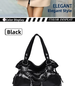 Detail of black soft leather tote bag with metallic chain and woven ring handle