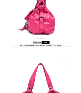 Detail view of pink leather tote bag side profile featuring silver rivets and metal hardware