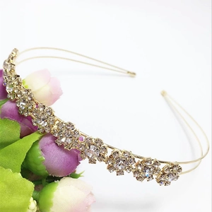 Elegant gold metal headband with crystal sunflower decorations for party or wedding
