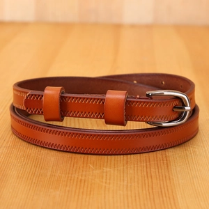Genuine brown leather belt for women featuring polished silver buckle and sawtooth stitching