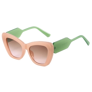 Fashionable oversized cat-eye sunglasses with pink frames and green temples