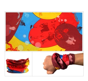 Detail of red and yellow seamless magic headwear showing cycling print and wrist wear style