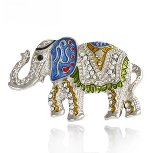 Exquisite elephant brooch featuring sparkling rhinestones, vibrant enamel and silver tone.