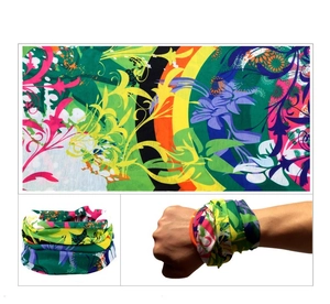 Detail view of seamless neck gaiter and wristband with colorful abstract floral pattern