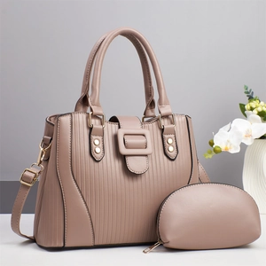 Elegant Morandi pink striped tote and pouch set with gold-tone buckle and rivets