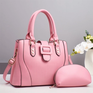 Pink striped handbag set with matching pouch featuring gold buckle and detachable shoulder strap