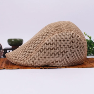 Detail view of khaki breathable mesh flat cap with fine woven texture for summer