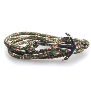 Detail view of army green nautical paracord bracelet with silver anchor metal clasp