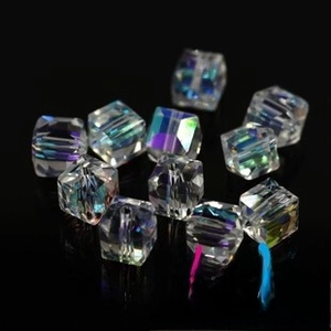 Macro shot of 6x8 multi-faceted teardrop glass beads with aurora AB coating for jewelry DIY