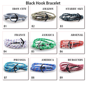 Detailed grid view of assorted multi-color braided rope anchor bracelets with metal hooks