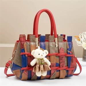Chic multi-color woven leather handbag with cute bear charm and red round handles