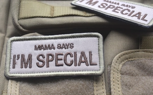 Detailed view of Mama Says I'm Special tactical embroidery patch on khaki fabric