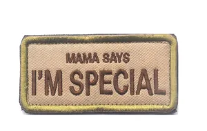 Detail of 9x4cm MAMA SAYS I'M SPECIAL embroidered patch with khaki base and gold border