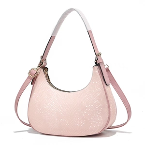 Pink crescent hobo bag with snake pattern texture and gold zipper in a studio shot