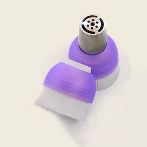 Close-up of silver Russian piping tip with purple and white silicone couplers