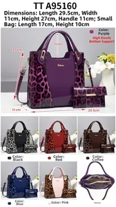 Detailed view of the 2-piece set featuring leopard print crossbody bag and small pouch