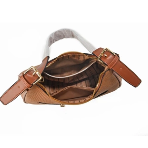 Internal detail of brown woven handbag featuring striped lining and zipper pocket