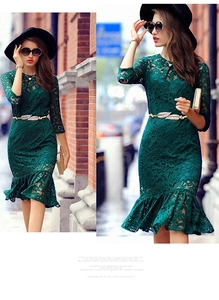 Close-up of golden leaf buckle on dark green lace mermaid dress with 3/4 sleeves