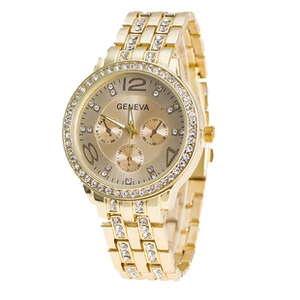 Detailed view of gold Geneva watch dial with rhinestone accents and mesh strap