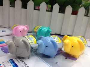 Detail of five colorful elephant pencil sharpeners with clear plastic waste collectors