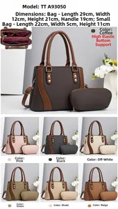 Detail view of stylish two-piece handbag set showing main bag and small matching pouch