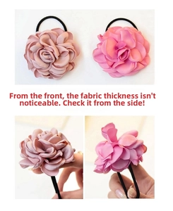 Detail of multi-layered fabric flower hair ties in dusty rose and peach pink tones