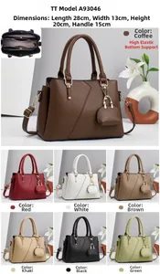 Detailed view showing the litchi texture leather bag with dimensions 28x13x20cm