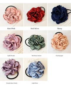 Detail of multi-layered fabric flower hair ties with high elasticity rubber bands in 8 colors