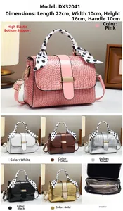 Detail showing crocodile texture crossbody bag with dimensions 22x10x16cm and polka dot scarf