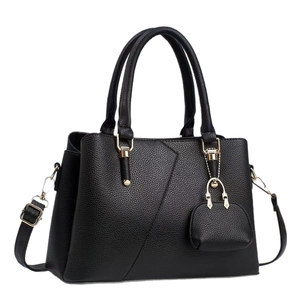 Classic black litchi pattern leather handbag for women with elegant golden hardware