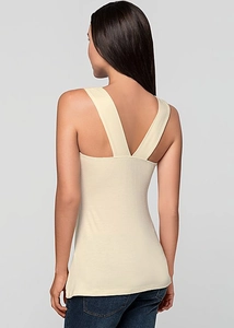 Detail view of the V-shaped back tailoring on this apricot sleeveless embroidered top