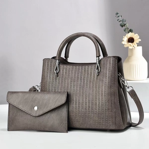 Dark gray textured leather handbag and small clutch bag set for women with striped pattern
