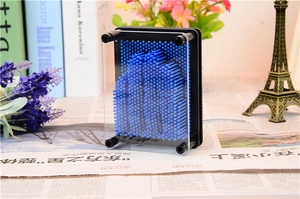 Detailed view of the blue 3D pin art clone toy with plastic pins and clear acrylic panel